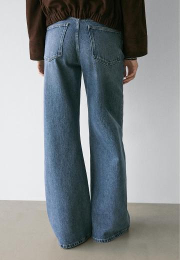 Клешеные джинсы