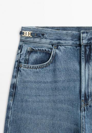 Клешеные джинсы