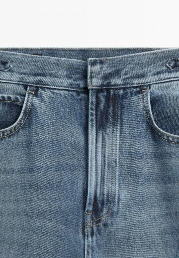 Клешеные джинсы