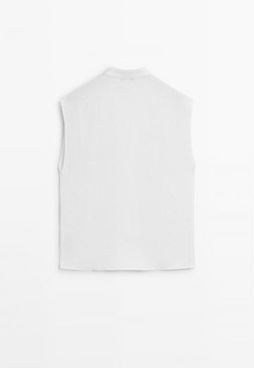 Блузка без рукавов