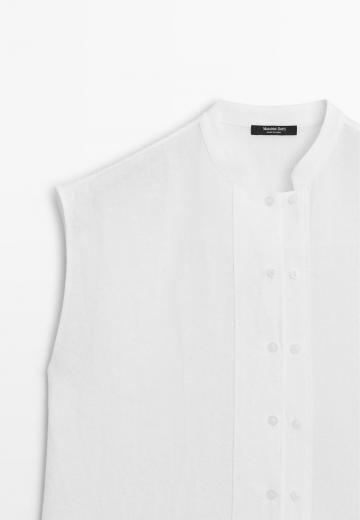 Блузка без рукавов