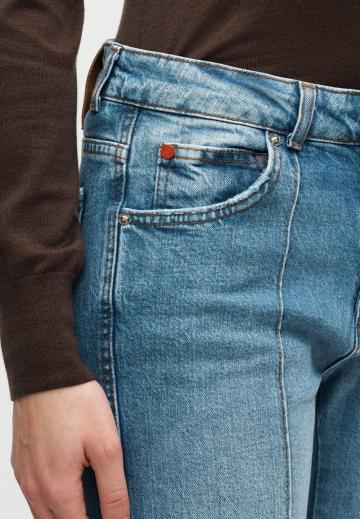 Клешеные джинсы