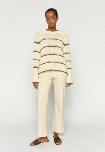 Клешеные джинсы