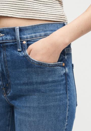 Клешеные джинсы