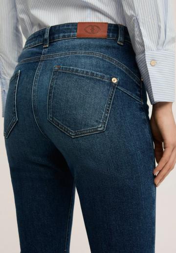 Клешеные джинсы