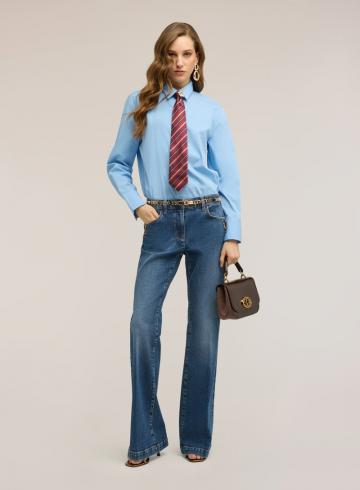 Клешеные джинсы