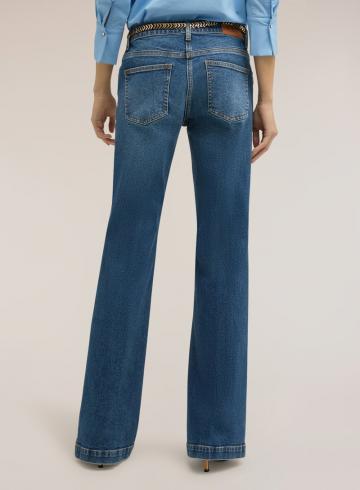 Клешеные джинсы