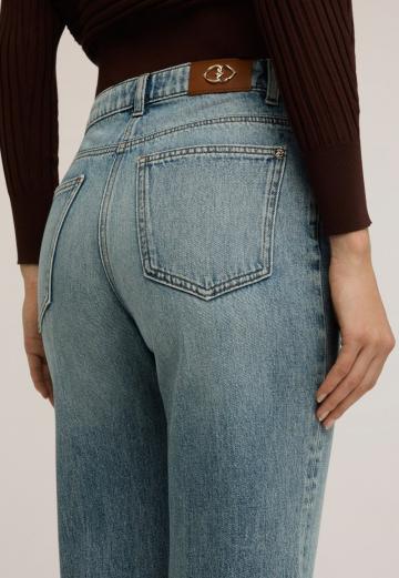 Клешеные джинсы