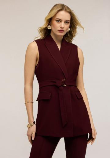 Длинный жилет