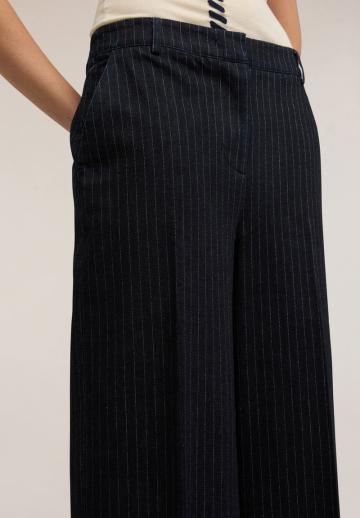 Клешеные джинсы