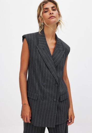 Длинный жилет