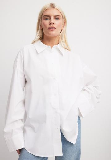 Длинная блузка