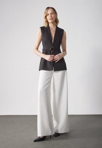 Длинный жилет