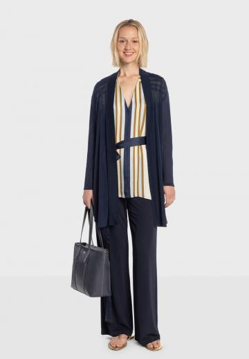 Длинный жилет