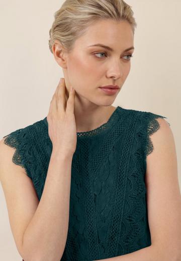 Блузка без рукавов