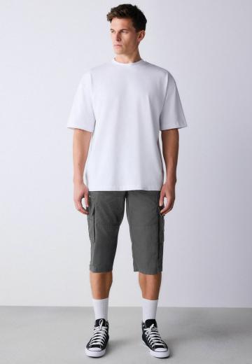 Брюки с накладными карманами