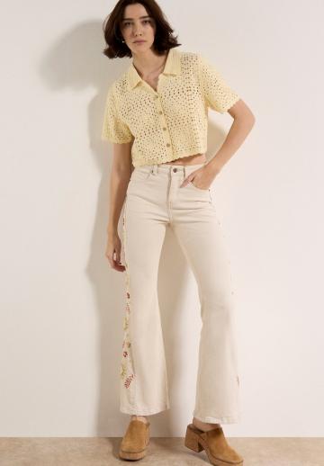 Клешеные джинсы