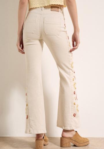 Клешеные джинсы