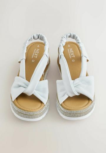 Босоножки на танкетке