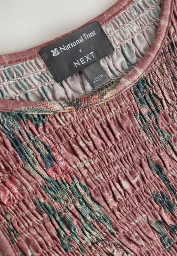 Блузка без рукавов