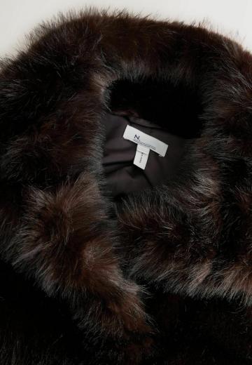 Пуховой жилет