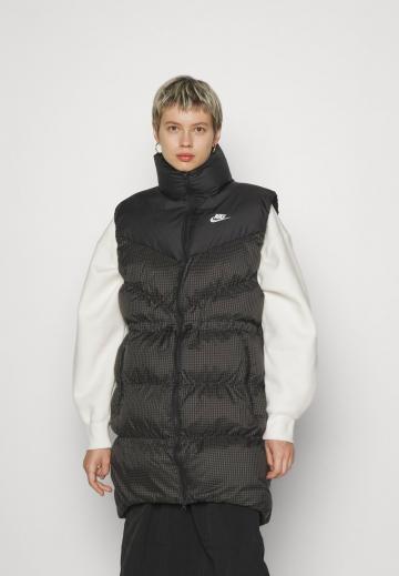 Пуховой жилет