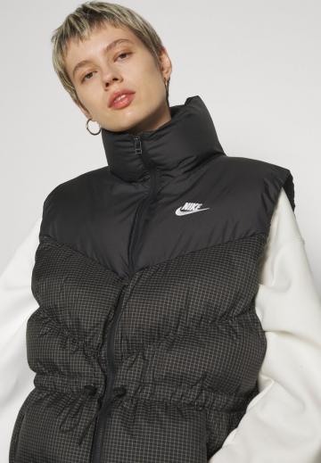 Пуховой жилет