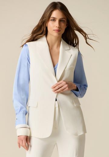 Длинный жилет