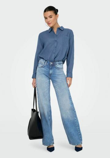 Клешеные джинсы