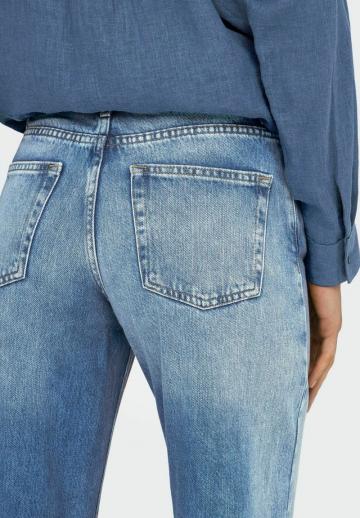 Клешеные джинсы