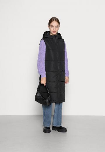 Длинный жилет