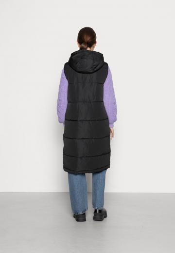 Длинный жилет