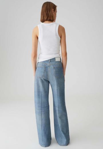 Клешеные джинсы
