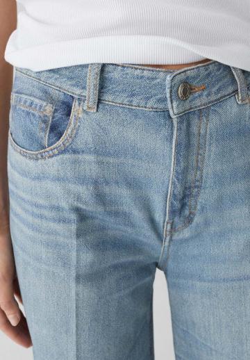 Клешеные джинсы