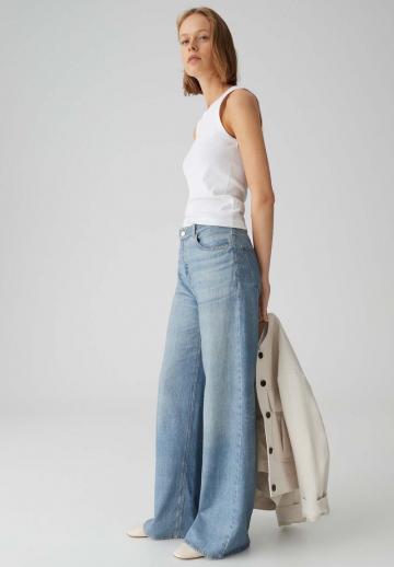 Клешеные джинсы