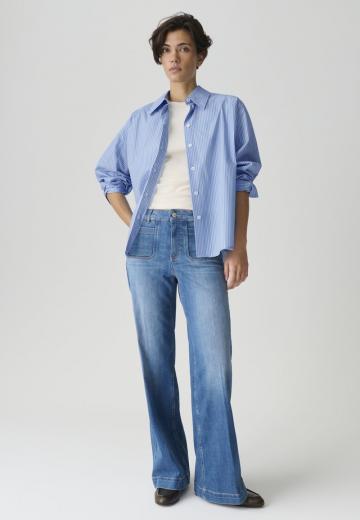 Клешеные джинсы