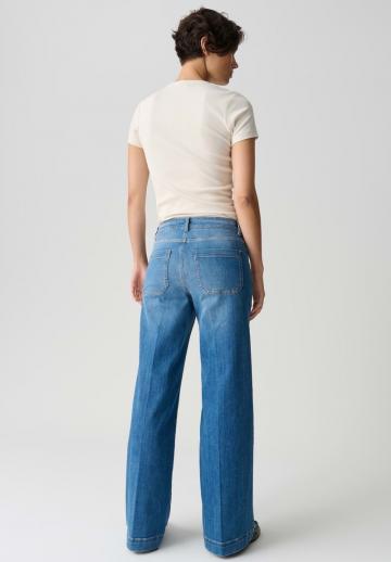 Клешеные джинсы