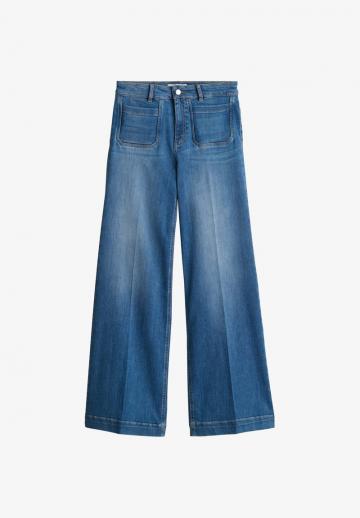 Клешеные джинсы