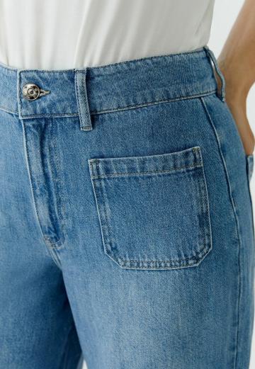 Клешеные джинсы