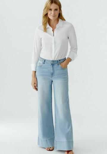 Клешеные джинсы