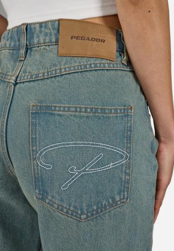 Клешеные джинсы