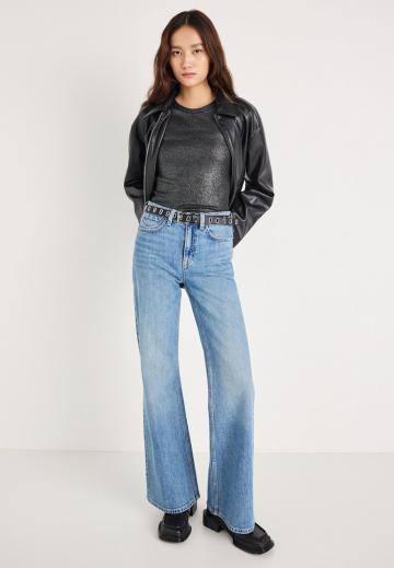 Клешеные джинсы