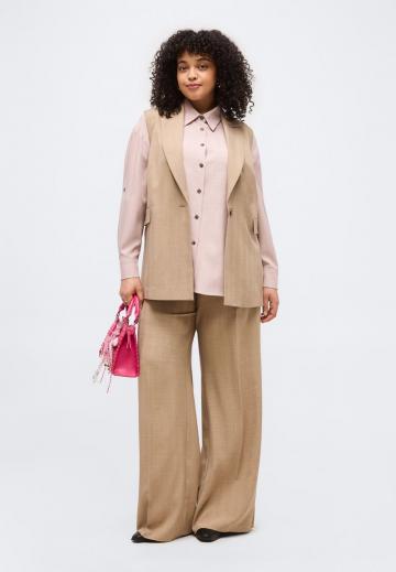 Длинный жилет