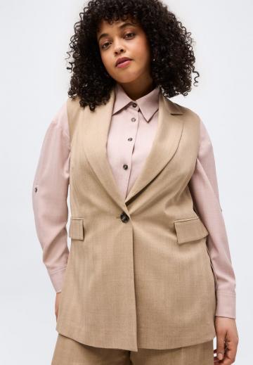 Длинный жилет