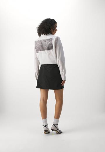 Юбка с накладными карманами