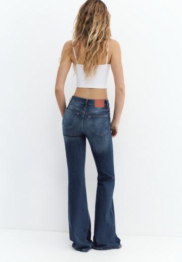 Клешеные джинсы