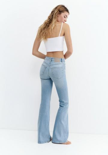 Клешеные джинсы