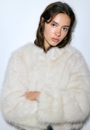 Пуховой жилет