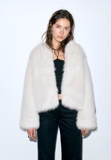 Пуховой жилет