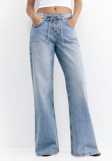 Клешеные джинсы